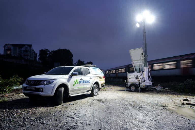 ProRXM Hybrid with Prolectric van and passing train night